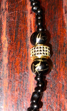 Load image into Gallery viewer, Lioness Black Neck &amp; Wrist Ornament Set